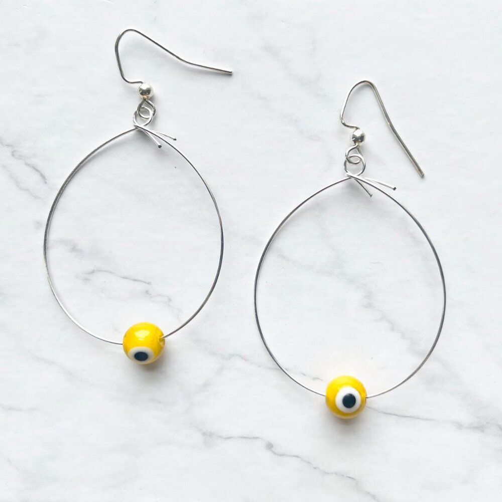 Silver Wire Tear Drop Earrings with Yellow Evil Eye Glass Bead